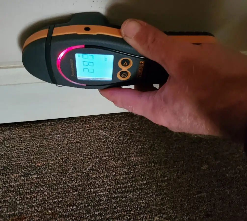 Moisture detection at baseboard during Storm Damage Restoration in Middlesborough